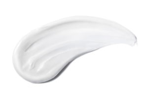 A photograph of a smudge of white cosmetic cream